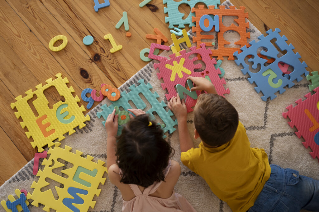 siblings playing with brain teaser toys